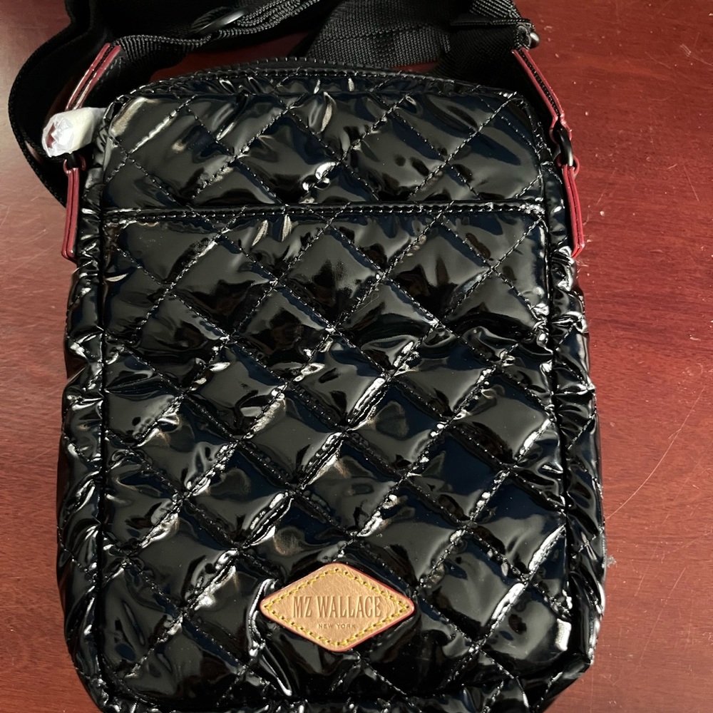 Brand new black laquer MZ Wallace crossbody bag.